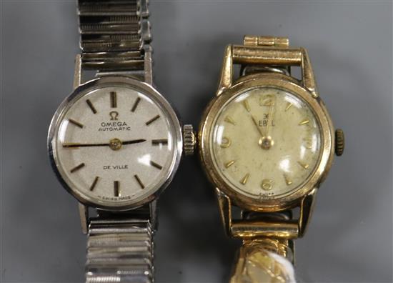 A ladys stainless steel Omega automatic De Ville wrist watch and a ladys Ebel wrist watch,